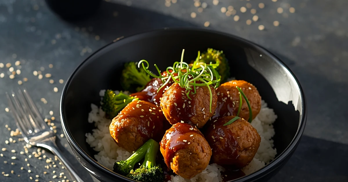 Bols de boulettes de poulet laquées au sésame et brocolis